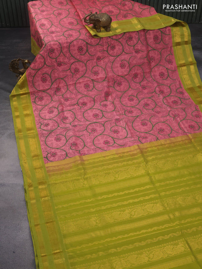 Silk cotton saree peach pink and lime green with allover kalamkari prints and rettapet zari woven border