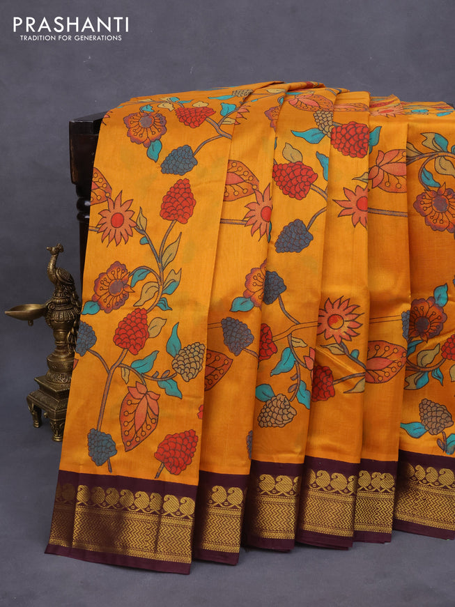 Silk cotton saree mango yellow and brown with allover kalamkari prints and zari woven korvai border