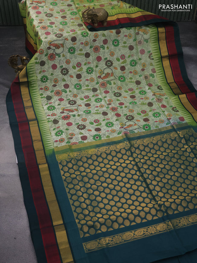 Silk cotton saree pastel green and bottle green with allover kalamkari prints and temple design zari woven simple border