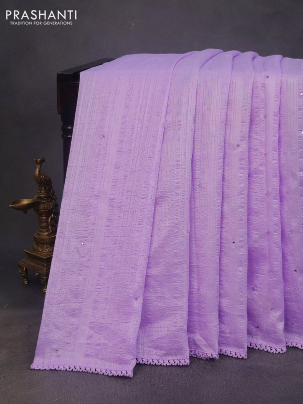 Raw silk saree lavender shade with allover mirror work and lace work border