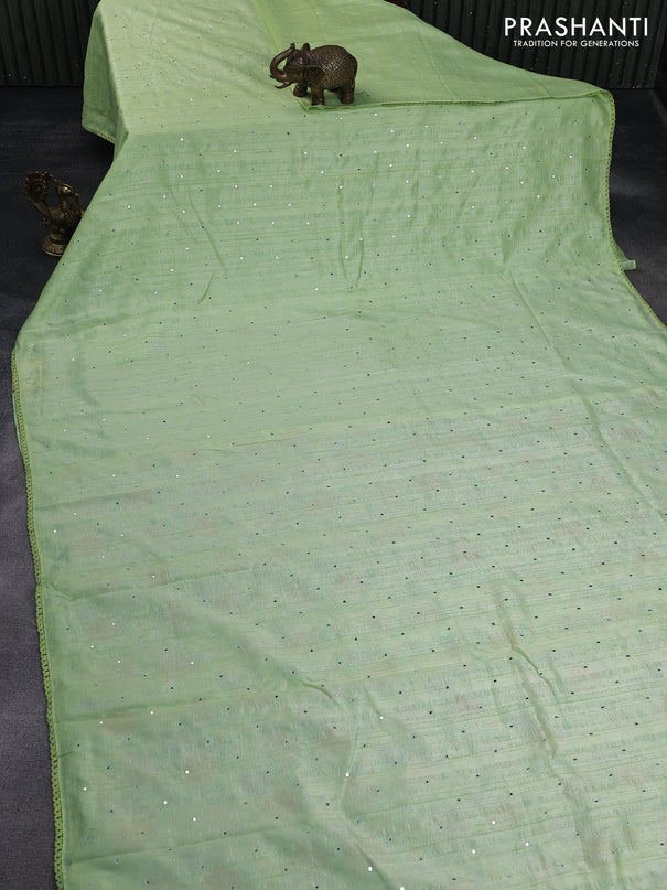 Raw silk saree pista green with allover mirror work and lace work border