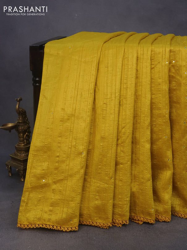 Raw silk saree mustard yellow with allover mirror work and lace work border