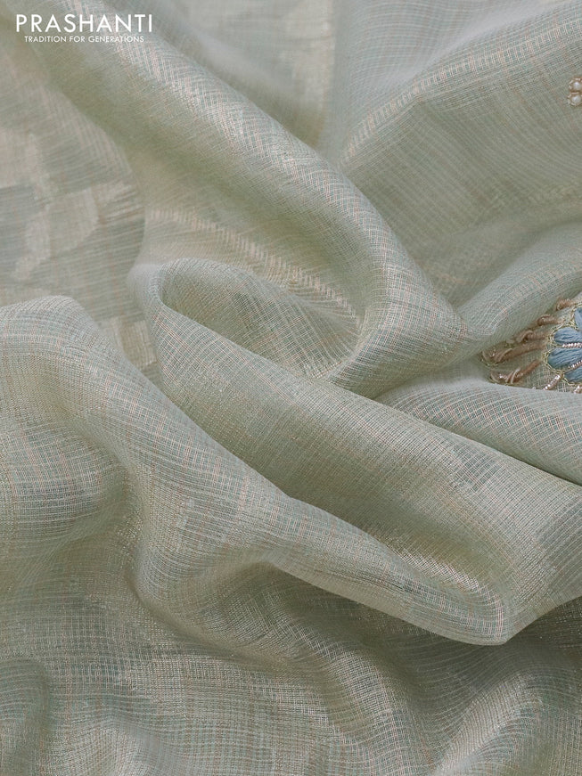 Tissue kota saree pastel green with allover banarasi zari weaves and embroidery work border