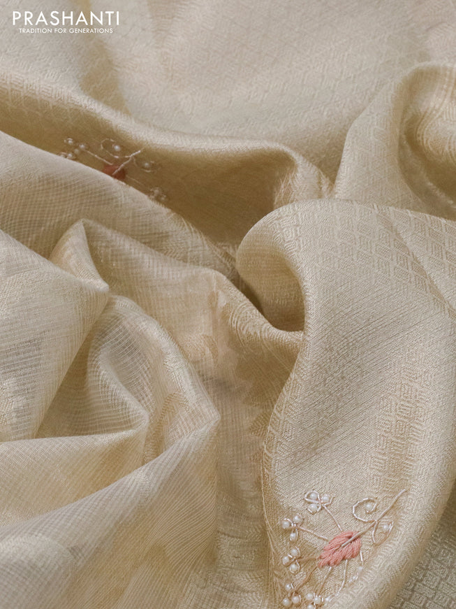 Tissue kota saree cream with allover banarasi weaves and zardosi work border