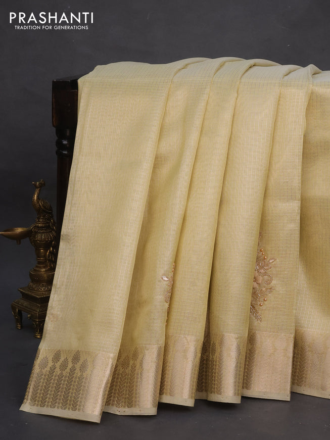 Tissue kota saree pale yellow with allover zari weaves & embroidery work buttas and zari woven border