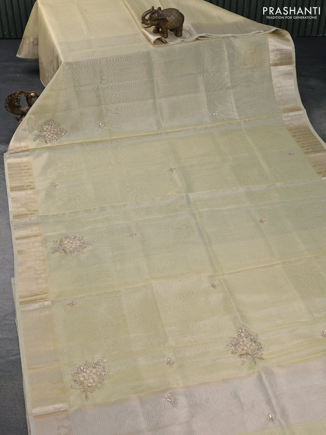 Tissue kota saree pale yellow with allover zari weaves & embroidery work buttas and zari woven border