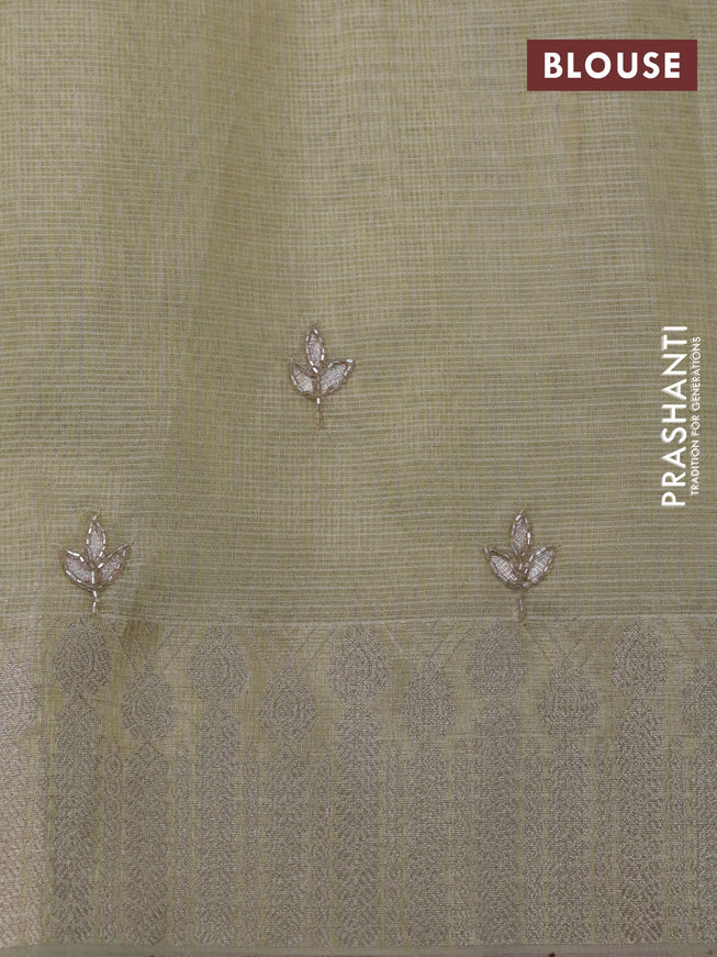 Tissue kota saree pale yellow with allover zari weaves & embroidery work buttas and zari woven border