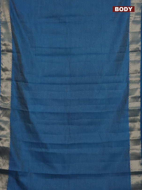 Semi raw silk saree cs blue with allover self emboss and zari woven border