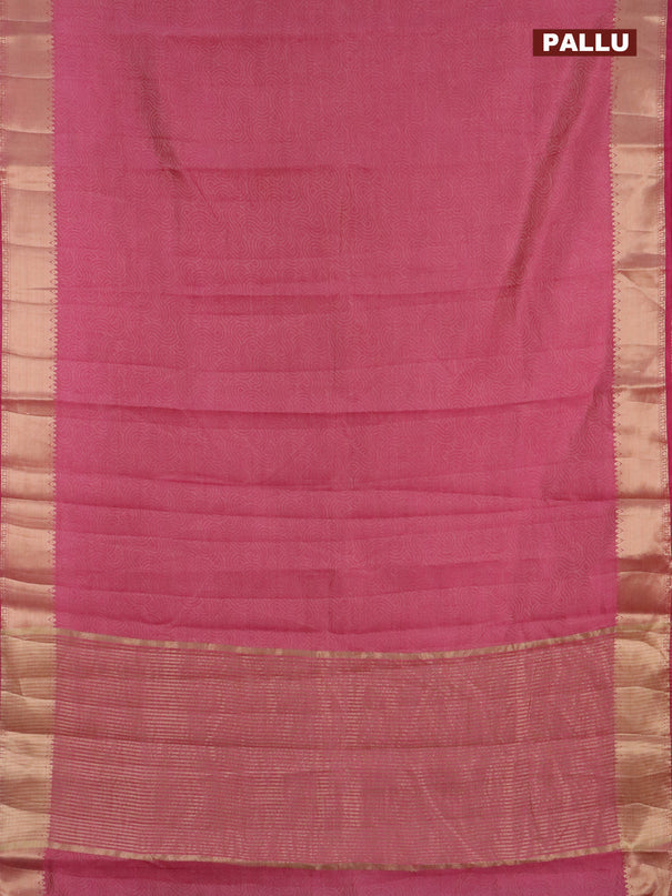 Semi raw silk saree pink shade with allover self emboss and zari woven border