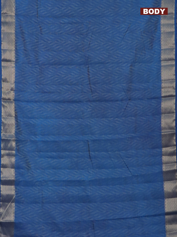 Semi raw silk saree cs blue with allover self emboss and zari woven border