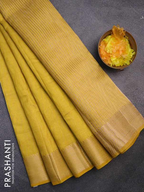 Semi raw silk saree yellow with allover self emboss and zari woven border