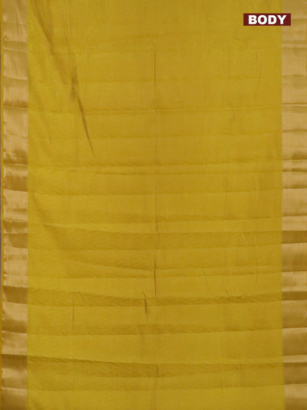 Semi raw silk saree yellow with allover self emboss and zari woven border