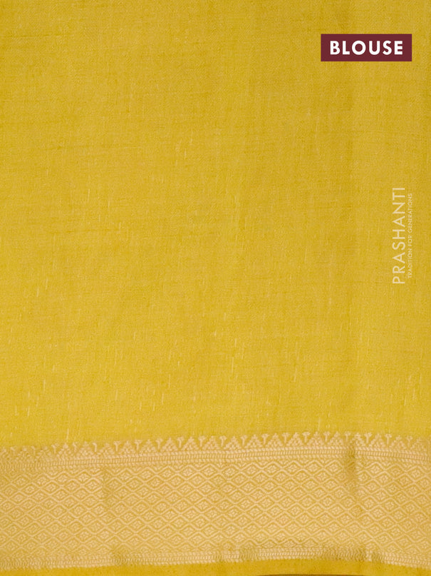 Semi raw silk saree yellow with allover self emboss and zari woven border