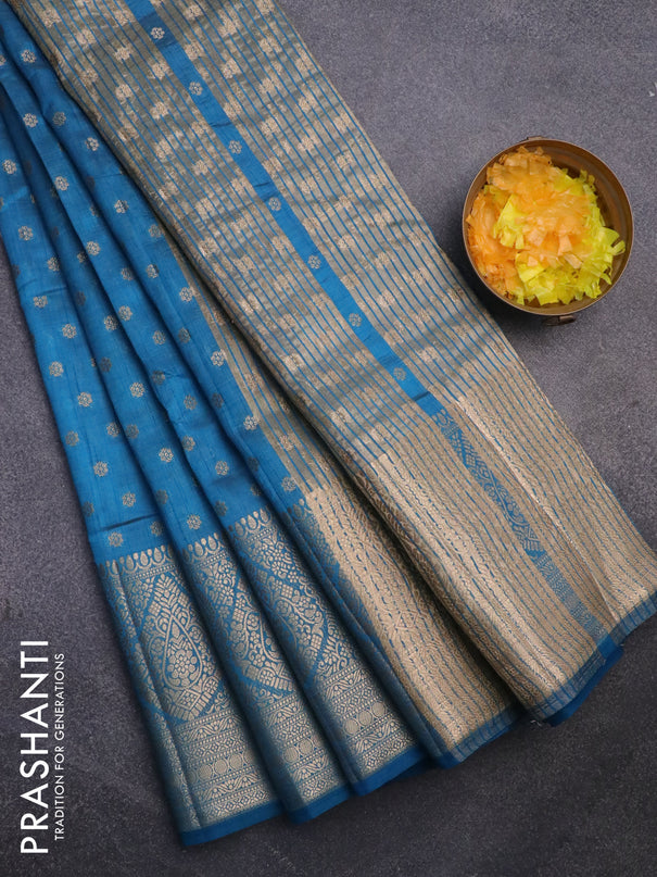 Semi raw silk saree cs blue with allover zari woven 1000 buttas and long zari woven border