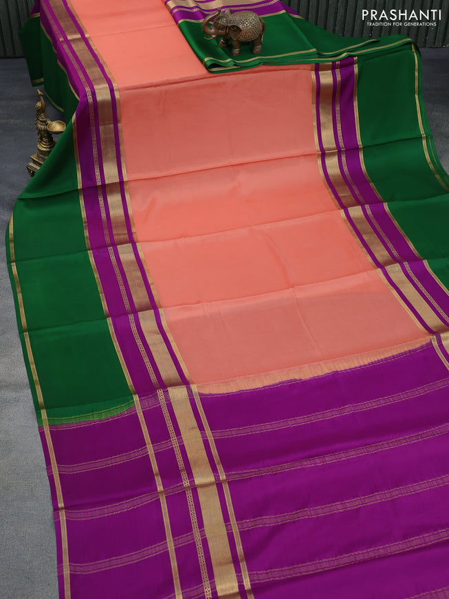 Pure mysore silk saree peach orange and purple green with plain body and long zari woven border