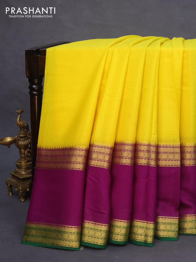 Pure mysore silk saree yellow and deep purple green with plain body and rettapet zari woven border