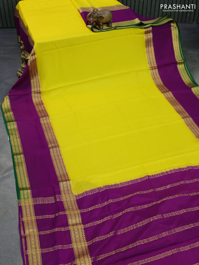 Pure mysore silk saree yellow and deep purple green with plain body and rettapet zari woven border