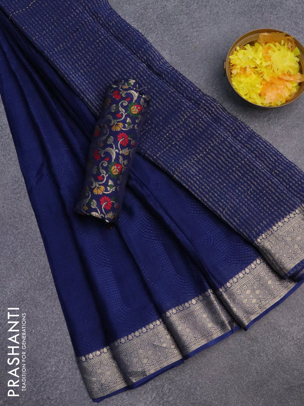 Semi crepe saree blue with self emboss and zari woven border - banarasi brocade blouse