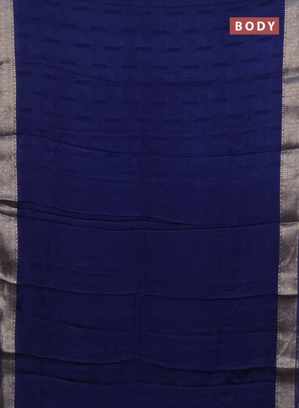 Semi crepe saree blue with self emboss and zari woven border - banarasi brocade blouse