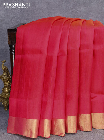 Pure raw silk saree reddish pink and blue with plain body and ikat woven pallu