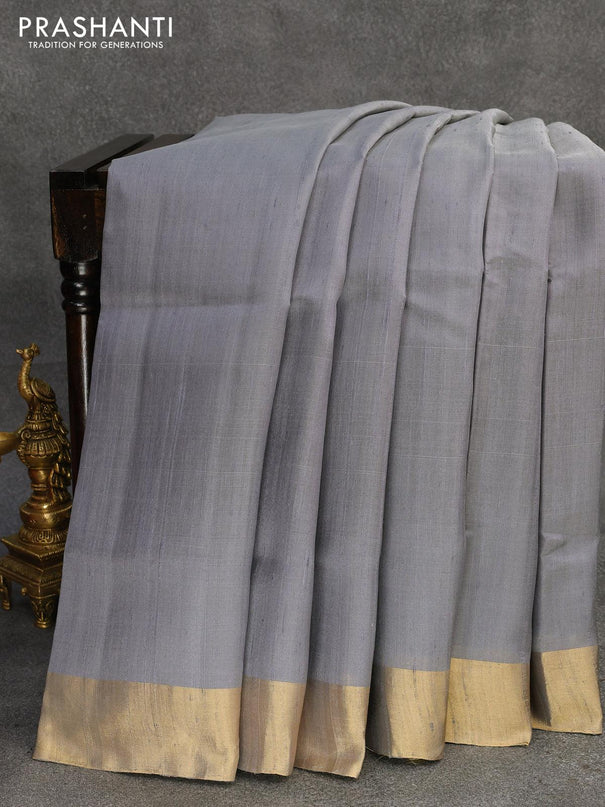 Pure raw silk saree grey and cs blue with plain body and ikat woven pallu