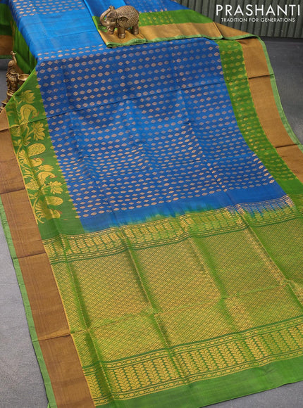 Pure uppada silk saree peacock blue and green with allover zari woven geometric weaves and floral & peacock design zari woven border