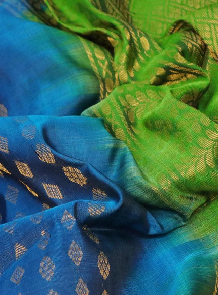 Pure uppada silk saree peacock blue and green with allover zari woven geometric weaves and floral & peacock design zari woven border