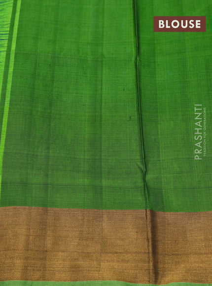 Pure uppada silk saree peacock blue and green with allover zari woven geometric weaves and floral & peacock design zari woven border