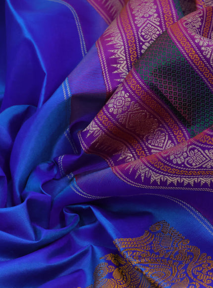 Pure kanjivaram silk saree dual shade of blue and dual shade of purple with thread woven buttas and long thread woven border