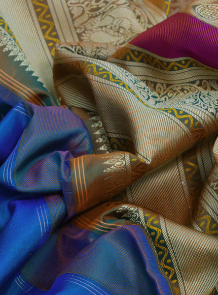 Pure kanjivaram silk saree dual shade of bluish green and dual shade of orange with thread woven buttas and thread woven border