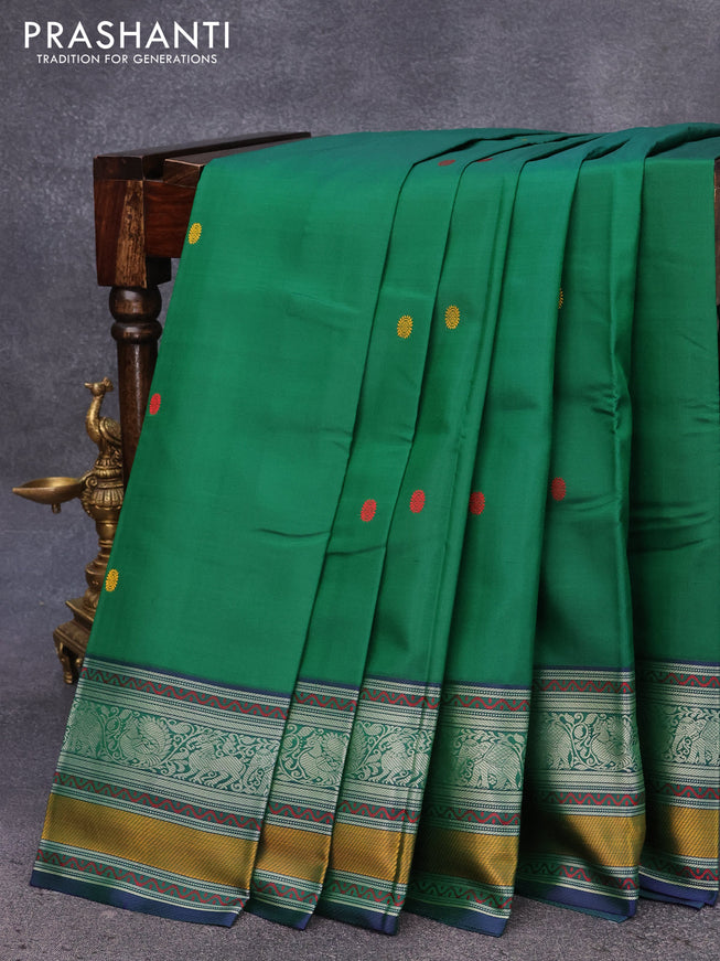 Pure kanjivaram silk saree green and dual shade of bluish green with thread woven buttas and thread woven border