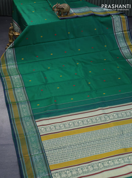 Pure kanjivaram silk saree green and dual shade of bluish green with thread woven buttas and thread woven border