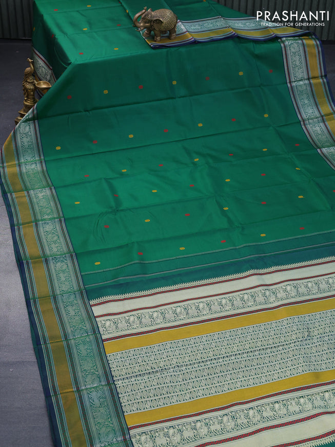 Pure kanjivaram silk saree green and dual shade of bluish green with thread woven buttas and thread woven border