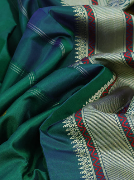 Pure kanjivaram silk saree green and dual shade of bluish green with thread woven buttas and thread woven border