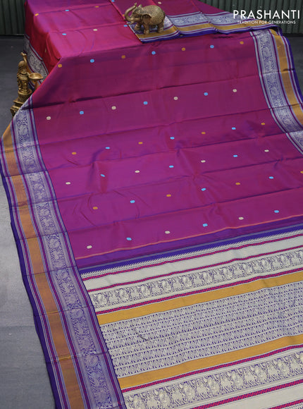 Pure kanjivaram silk saree dual shade of magenta pink and blue with thread woven buttas and rich thread woven border