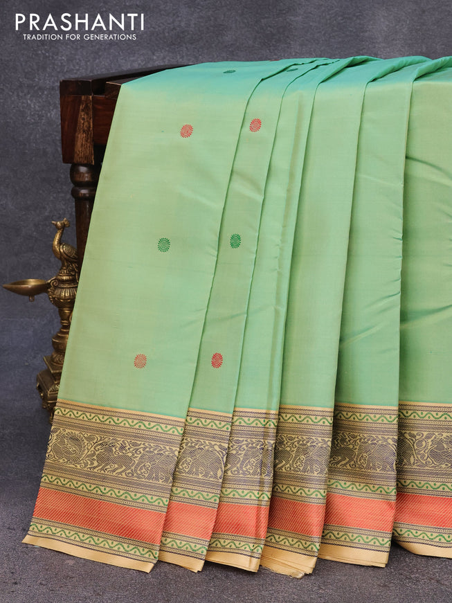 Pure kanjivaram silk saree dual shade of pastel green and sandal with thread woven buttas and rich thread woven border