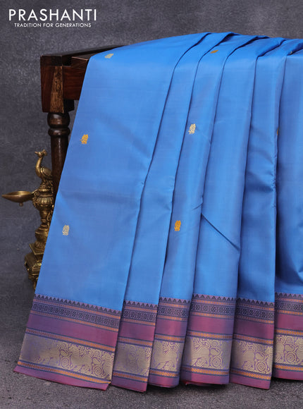 Pure kanjivaram silk saree blue and dual shade of bluish red with thread woven buttas and thread woven border