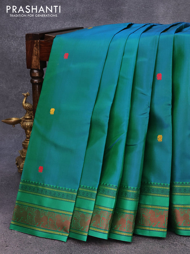 Pure kanjivaram silk saree dual shade of teal bluish green and green with thread woven buttas and thread woven border