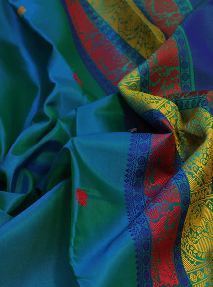 Pure kanjivaram silk saree dual shade of teal bluish green and green with thread woven buttas and thread woven border