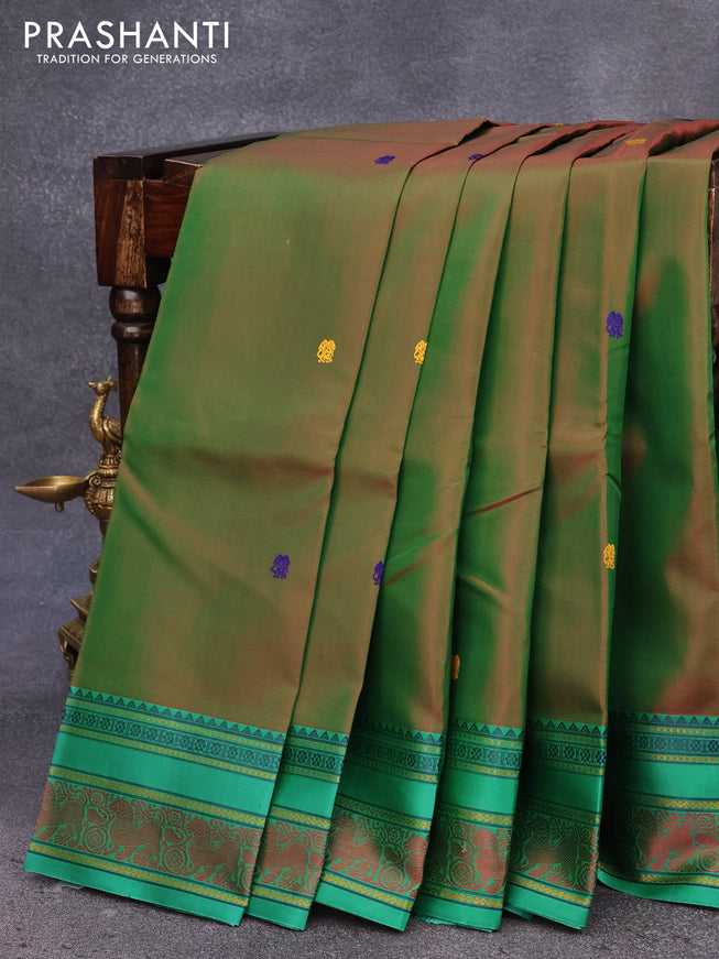 Pure kanjivaram silk saree dual shade of greenish red and green with thread woven buttas and thread woven border