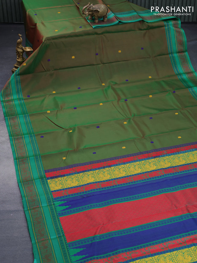 Pure kanjivaram silk saree dual shade of greenish red and green with thread woven buttas and thread woven border