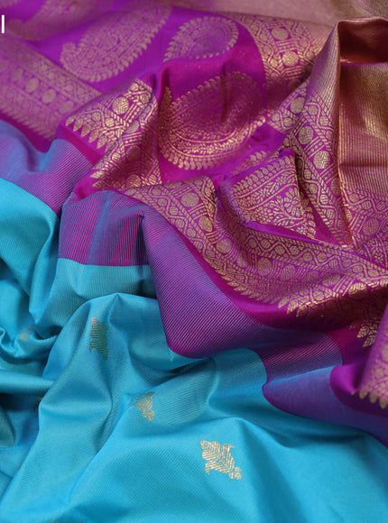 Pure gadwal silk saree light blue and purple with allover zari woven buttas and temple design long zari woven border