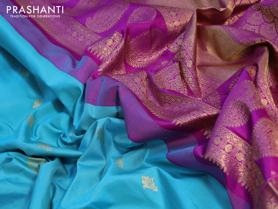 Pure gadwal silk saree light blue and purple with allover zari woven buttas and temple design long zari woven border