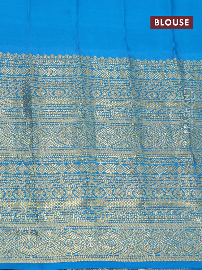 Pure gadwal silk saree green shade and cs blue with allover zari woven buttas and long zari woven border