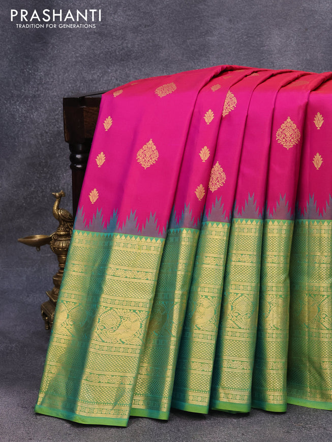 Pure gadwal silk saree magenta pink and dual shade of green with allover zari woven buttas and temple design long zari woven border