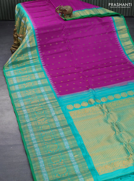 Pure gadwal silk saree pink and teal green with zari woven floral buttas and long zari woven border