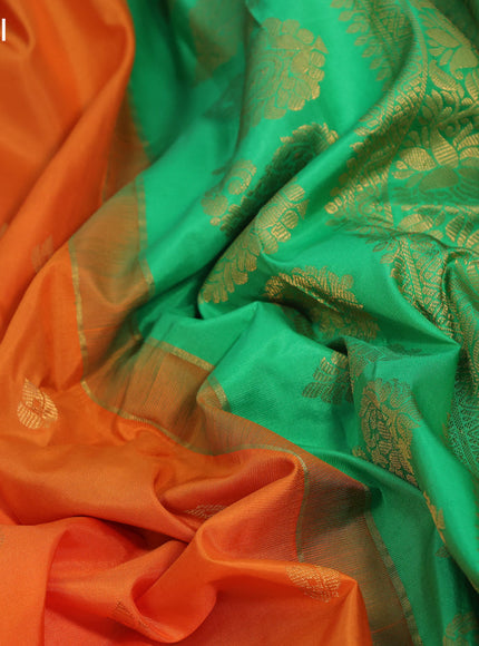 Pure gadwal silk saree orange and light green with zari woven buttas and temple design zari woven border