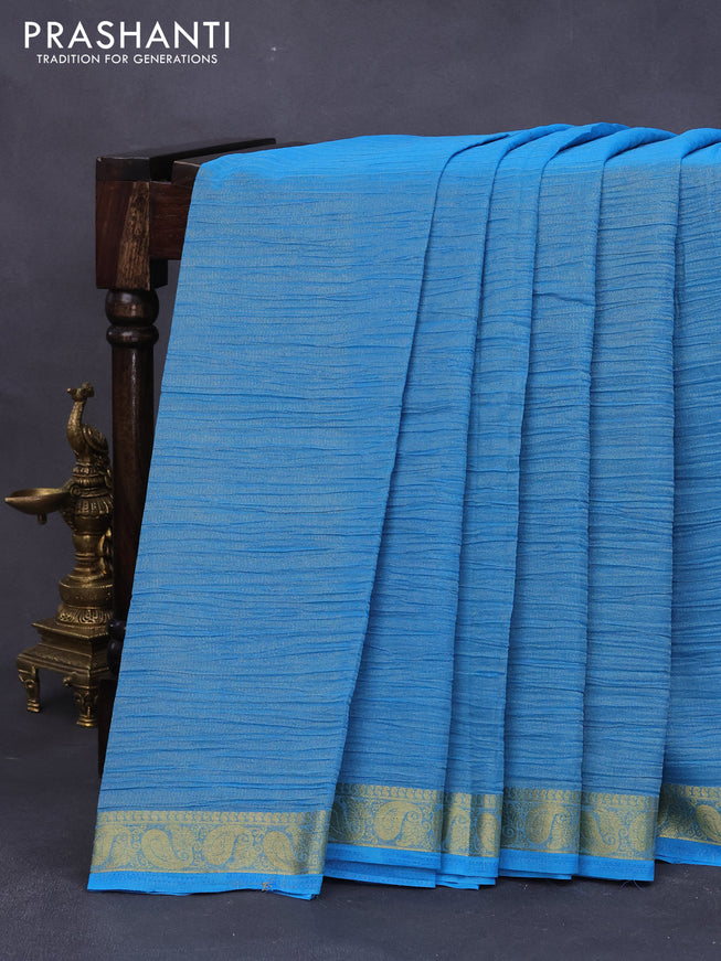 Crushed tissue saree cs blue with plain body and paisley zari woven border