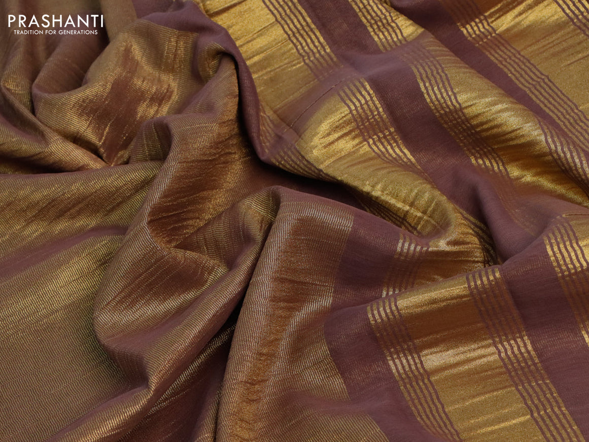 Crushed tissue saree brown shade with plain body and zari woven border