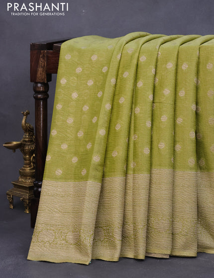 Crushed tissue saree lime green with zari woven buttas and long zari woven border